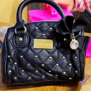 Betsey Johnson mini black quilted bag with gold hearts.  Brand new. Fully lined.